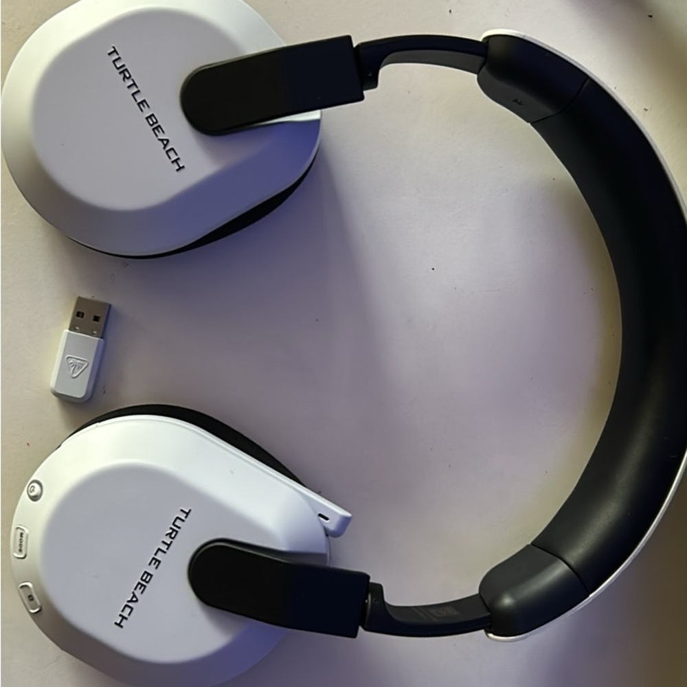 Sleek Black and White Over-Ear Headphones with Adjustable Comfort